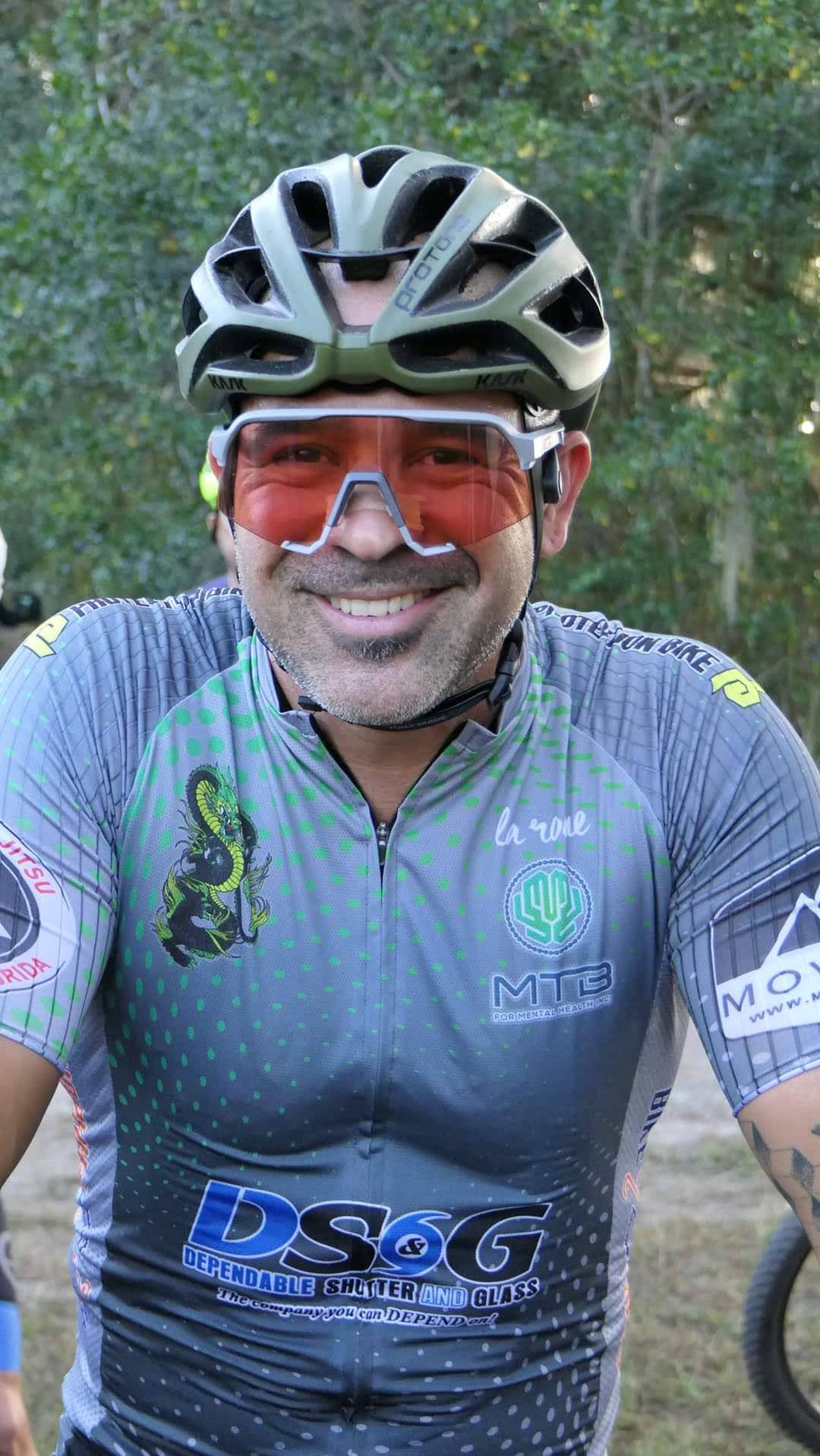 Miguel Hincapie wearing MTB4MH cycling gear on a trail